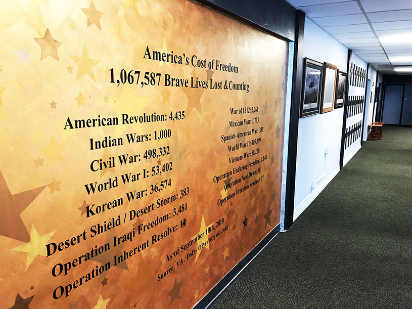 The Hall of Honor hallway inside the Portrait of a Warrior Gallery